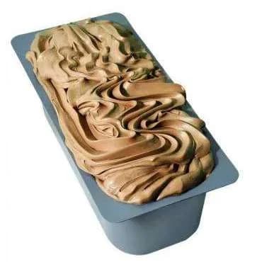 A 5-litre stainless pan filled with freshly churned hazelnut gelato, swirled and ready to scoop